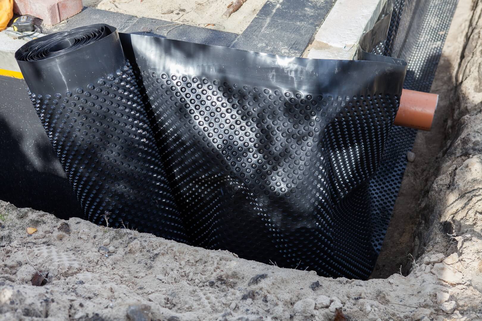 EXTERIOR BASEMENT DRAINAGE SYSTEM